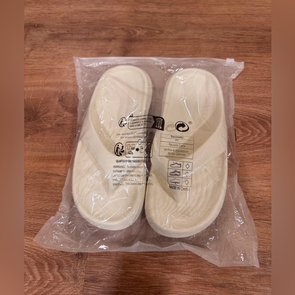 Cream supportive flip flops​​​​